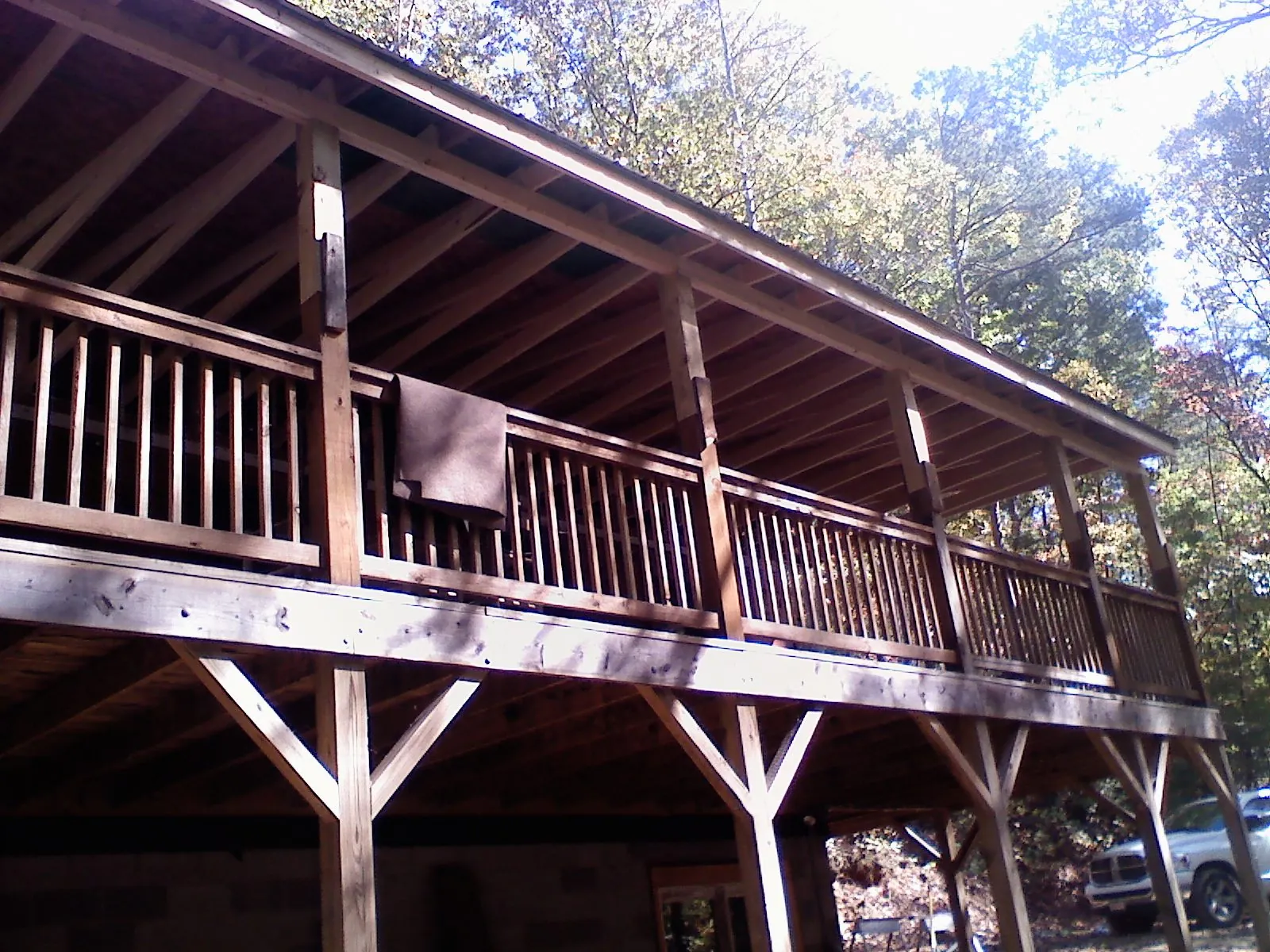 Timber framing under a new elevated porch and deck — Roof Leak Repair in Woodinville by Roofing Brothers